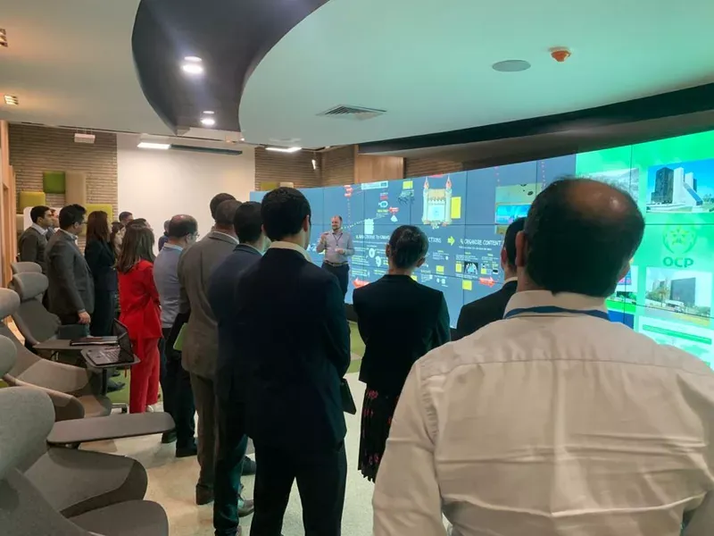 Curved 9×3 touch-interactive videowall for training and operations analysis.